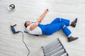 The worker after falling from height - unsafe behavior Royalty Free Stock Photo