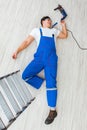 Worker after falling from height - unsafe behavior Royalty Free Stock Photo