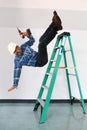 Worker Falling Off a Ladder