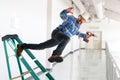 Worker Falling Off Ladder Royalty Free Stock Photo