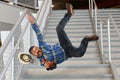 Worker Falling on Stairs Royalty Free Stock Photo