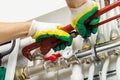 Worker fixing heating system Royalty Free Stock Photo