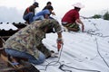 Worker fixing roof top