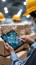 Worker focuses on tablet while scanning barcodes in warehouse, managing documents and tracking cargo efficiently Royalty Free Stock Photo