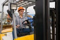 Worker & forklift Royalty Free Stock Photo