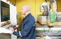 Worker at furniture manufacture workshop