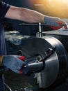 Worker in gloves working on a lathe Royalty Free Stock Photo