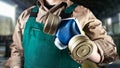 Worker in green overall outfit with respirator Royalty Free Stock Photo