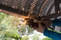 Worker grinding and cutting metalsheet of roof Royalty Free Stock Photo
