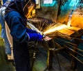 Worker grinding metal Royalty Free Stock Photo