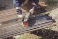 A worker grinds a rusty metal pipe Royalty Free Stock Photo