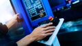 Worker hand controling cnc machine Royalty Free Stock Photo