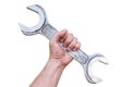Worker hand holding big spanner tool wrench on white background Royalty Free Stock Photo