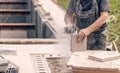 Worker hand using circular saw Royalty Free Stock Photo