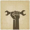 Worker hand with wrench symbol Royalty Free Stock Photo