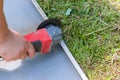 Worker hands cutting a metal sheet Royalty Free Stock Photo