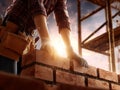 Construction worker laying bricks with mortar Royalty Free Stock Photo