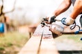 worker hands using airbrush and spray gun for painting timber Royalty Free Stock Photo