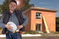 Worker handsome man with helmet security front house of brick in construction site