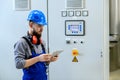 Worker with helmet ,ear protector and tablet computer Royalty Free Stock Photo