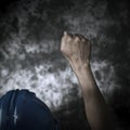 Worker with his fist raised to the air Royalty Free Stock Photo