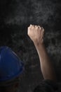 Worker with his fist raised to the air Royalty Free Stock Photo