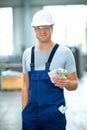 Worker with his wages Royalty Free Stock Photo