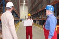 Worker holding box in warehouse Royalty Free Stock Photo