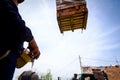 Worker is holding remote, wireless, control for overhead crane Royalty Free Stock Photo