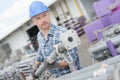 Worker holding scaffolding pole Royalty Free Stock Photo