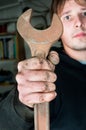 Worker holding spanner Royalty Free Stock Photo