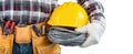 The worker holding a yellow safety helmet and cables ready for installation. AI generated image Royalty Free Stock Photo