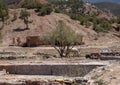 Worker house and donkeys at the Salt pans in the Atlas Mountains of Morocco.