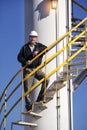 A worker at an industrial manufacturing facility