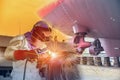 Shipyard worker welding ship repair