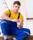 Worker with injured hand at construction site Royalty Free Stock Photo