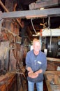 Worker inside a Dutch windmill