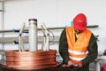 Worker inspect copper wire Royalty Free Stock Photo