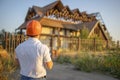 Worker, Inspector or engineer is checking and inspecting the building or house before restoration, reconstruction or demolition. Royalty Free Stock Photo