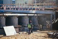 Worker inspects the new bridge construction site Royalty Free Stock Photo