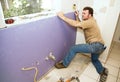 Worker Installing Drywall