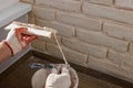 A worker is installing  brick tiles on the wall Royalty Free Stock Photo