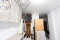 Worker installing new countertop in modern kitchen Royalty Free Stock Photo