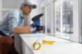 worker installing new plastic pvc window. Royalty Free Stock Photo