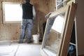 Worker installing new window Royalty Free Stock Photo