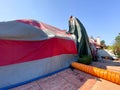 Worker installing a tent on a residential villa for termite fumigation Royalty Free Stock Photo