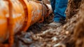 A Worker Installing Underground Pipeline. AI generated Royalty Free Stock Photo