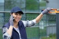 worker installing welded metal mesh fence Royalty Free Stock Photo