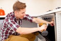 Worker installs a electric cooker