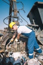 Worker in a junkyard Royalty Free Stock Photo